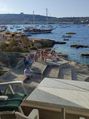 BEACHFRONT with Seaviews Apartment No56 Award Winner Unbeatable Location for Closeness to the Sea Ideal for Guests looking for Winter Spring and Autumn Breaks in Sunny Malta Also Ideal for Coastal Hik